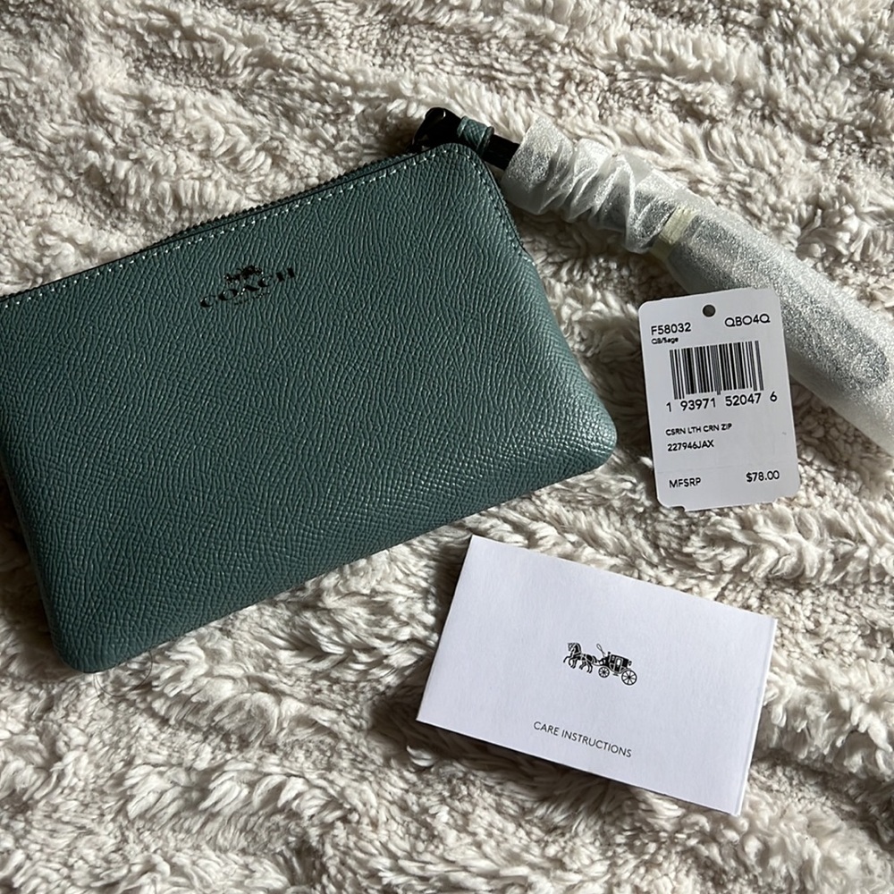 Coach light blue wristlet wallet